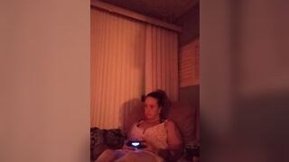 Cougar with bosom showcasing frolicking vid games