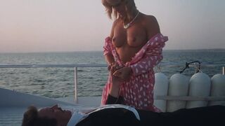 Belinda Mayne – White Fire (1984) classic topless movie scene