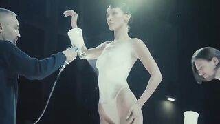 Dress sprayed onto model on Coperni runway at Paris Fashion Week