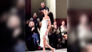 Liquid dress showcased at Paris Fashion Week. Coperni brand brought a naked Bell