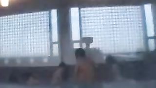 Hidden camera in an all female locker room shows Asian girls getting naked