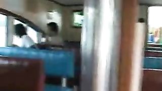 Watch a horny Asian school girl in revealing summer dress show off on a bus