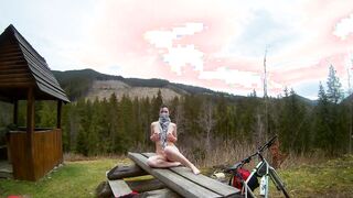 Bare gal in the mountains